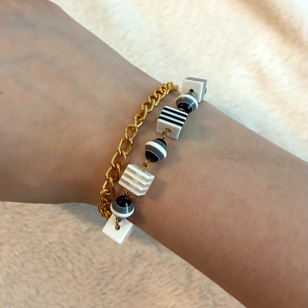 White, black and gold bracelet